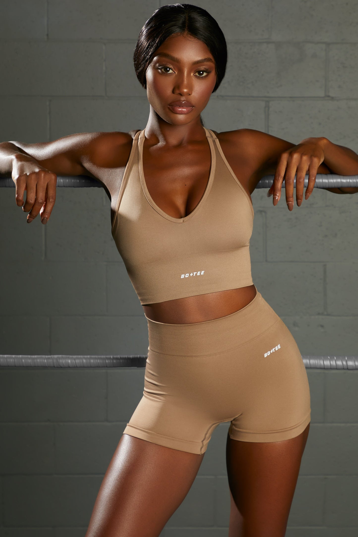 Overhaul Racer Knot Back Seamless Crop Top in Brown