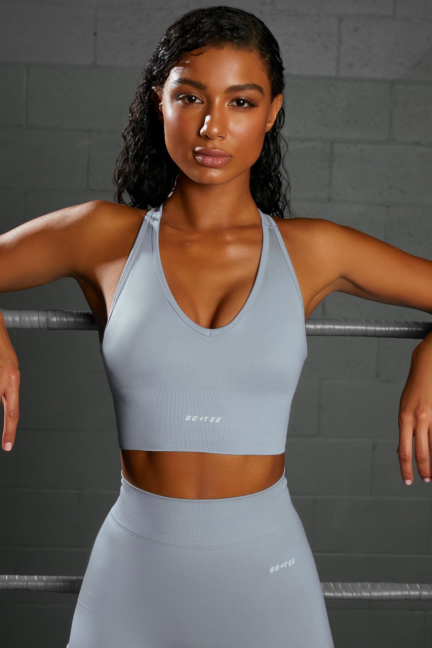 Overhaul Racer Knot Back Seamless Crop Top in Blue